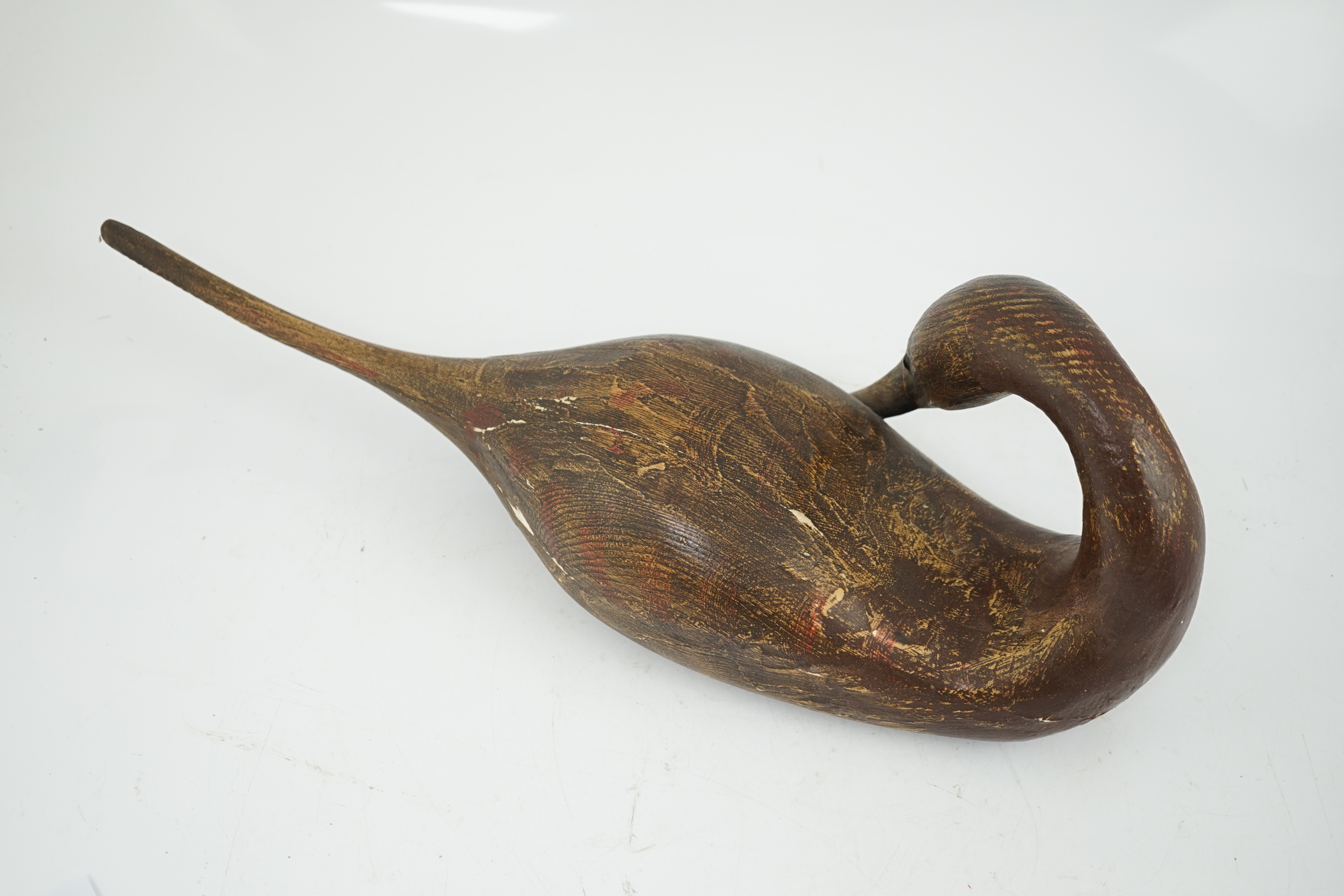 Guy Taplin (British, b.1939), a carved and painted wood figure of a pintail duck